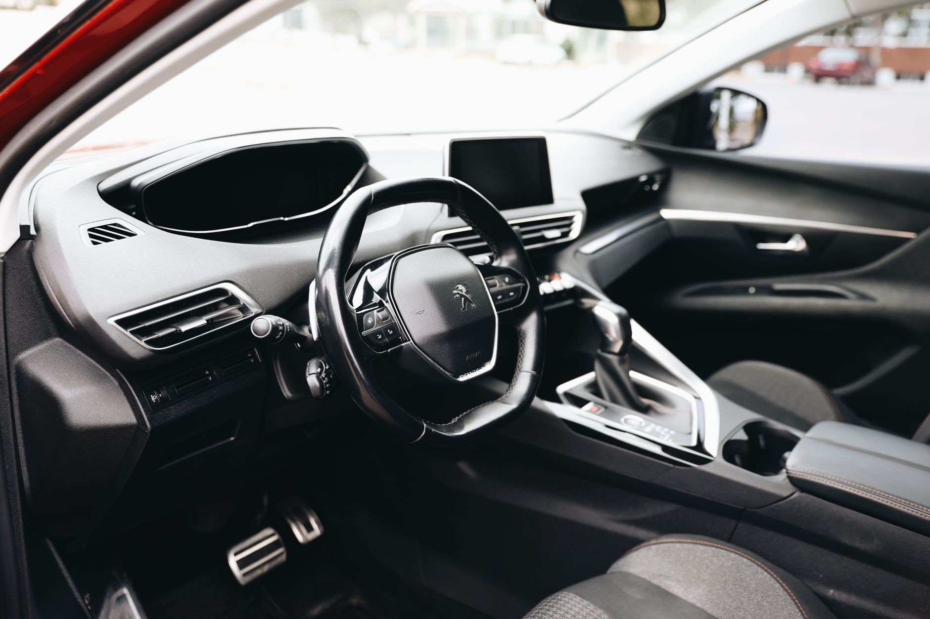Sleek design of a Peugeot's interior viewed in daylight in Sivas, Türkiye.