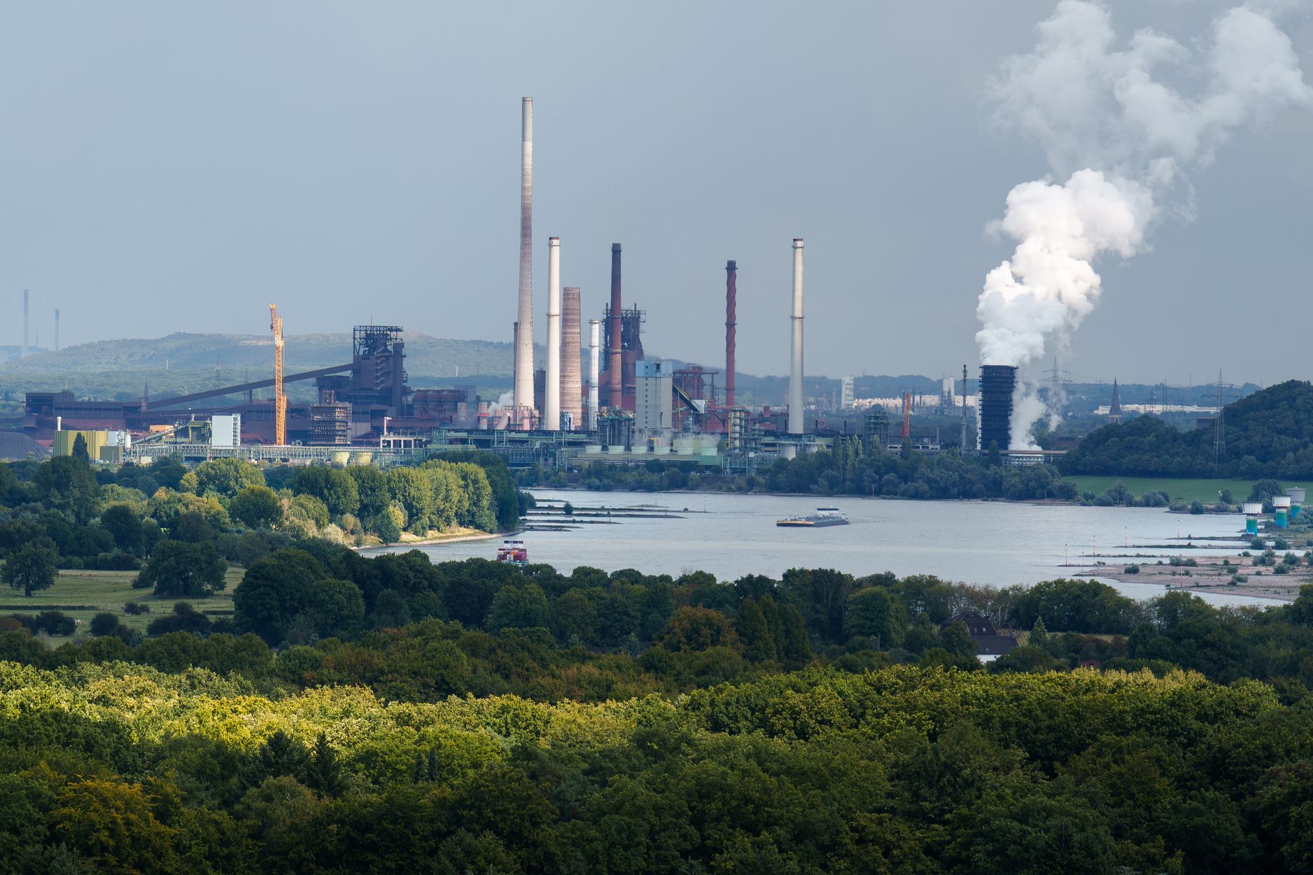 Scenic view of an industrial factory by the Rhine River in Duisburg, Germany.
